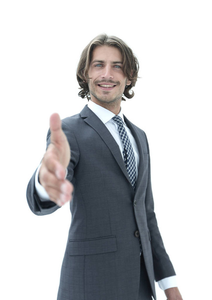 Smiling friendly businessman offers a handshake - Fotó, kép