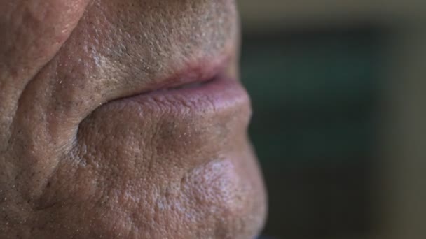 close up on old man smoking cigarette - Filmmaterial, Video