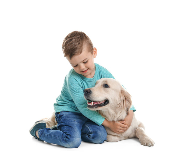 Cute little boy with his pet on white background - Fotoğraf, Görsel