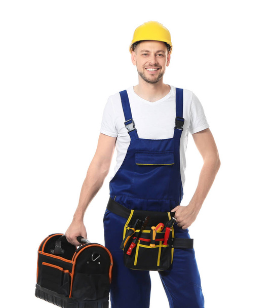 Electricista con caja de herramientas sobre fondo blanco
 - Foto, Imagen
