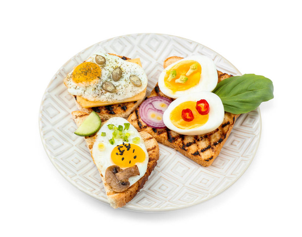 Plate with different delicious toasts on white background - Photo, Image