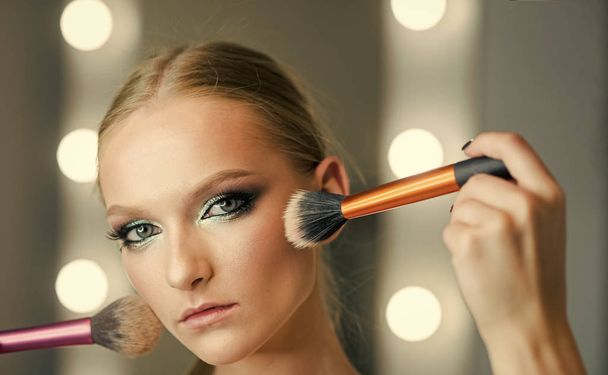 Visage model with makeup brushes. Visage course for glamour makeup. Sexy woman. - Fotoğraf, Görsel