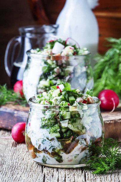Summer cold soup with vegetables, herbs and yogurt in glass jars, rustic style, vintage wooden background - Φωτογραφία, εικόνα