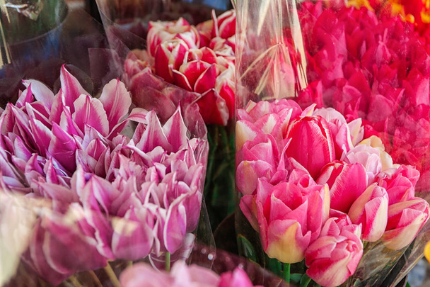 Beautiful bouquets of tulips in flower shop - Valokuva, kuva
