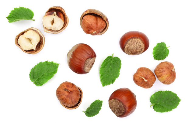 Hazelnuts with leaves isolated on white background. Top view. Flat lay - Photo, Image