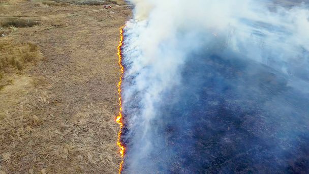 A big fire. The dry grass is burning. much smoke.  Ekaterinburg, Russia, From Dron   - Photo, Image