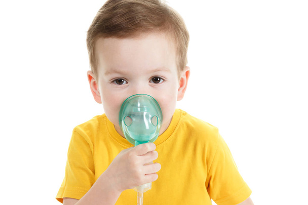 Asthma patient, children boy diagnosis asthma inhalation therapy the mask of inhaler. Close up a little kid with respiratory disease problem or asthma. - Foto, immagini