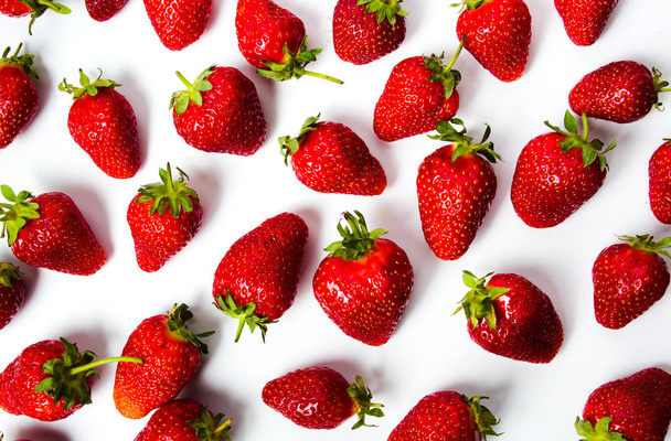 Bunch of strawberries on white background top view - Valokuva, kuva