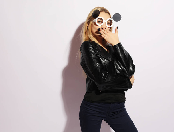 beauty and fashion concept: young woman with creative sunglasses - 写真・画像