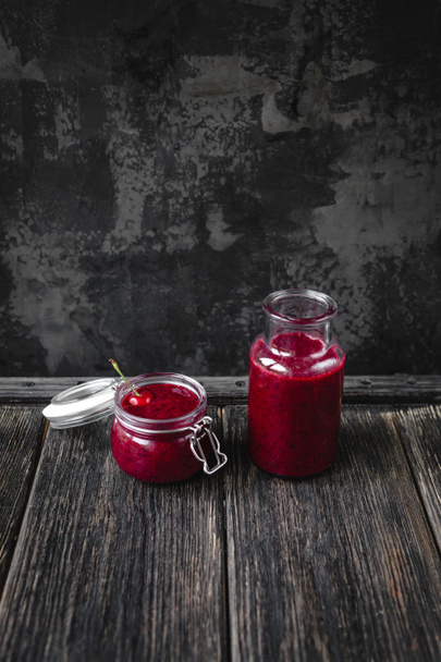 Fresh healthy smoothie with cherry on rustic table - Фото, зображення