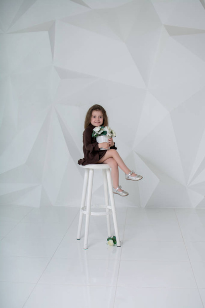 portrait of cute little girl in studio  - Zdjęcie, obraz