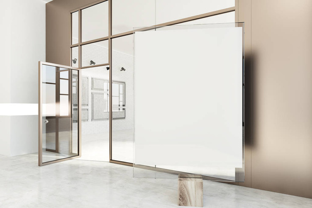 Poster gallery with beige and white walls, a concrete floor and glass doors. A vertical mock up poster in the foreground. A side view. 3d rendering - 写真・画像
