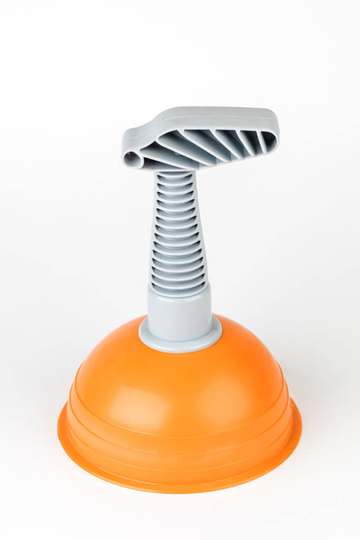 Plunger (plunger) orange for cleaning toilet on white background - Photo, Image