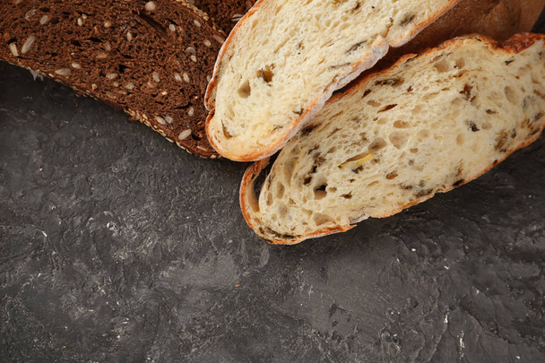 Variety of fresh tasty bread on table - Zdjęcie, obraz