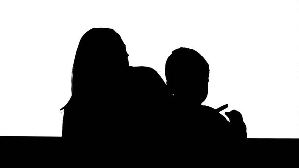 Silhouette Happy family mother and child painting together - Foto, Imagem
