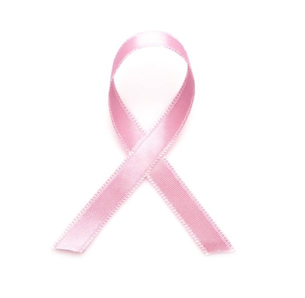 Ruban rose sur fond blanc. Concept de cancer du sein - Photo, image