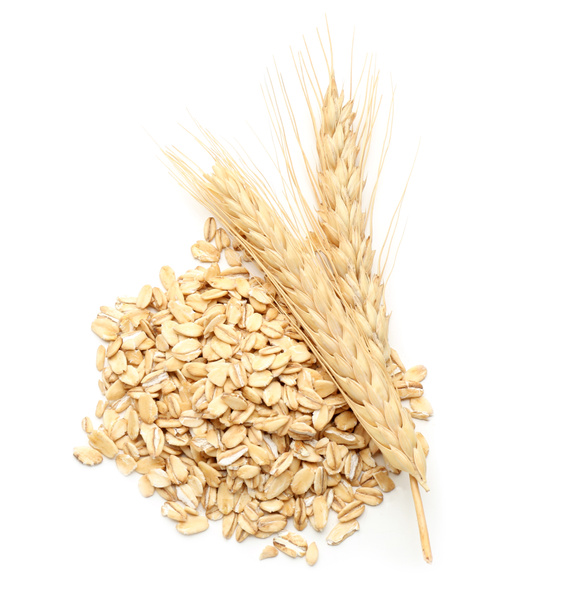 Heap of raw oatmeal and spikelets on white background - Photo, Image