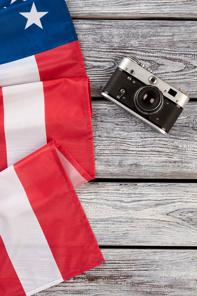American flag and vintage camera, top view. - Photo, Image