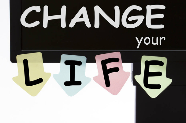 CHANGE YOUR LIFE written on color stickers on computer display. Business concept. - Valokuva, kuva
