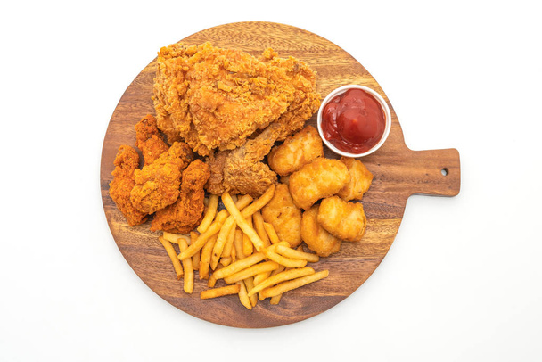 fried chicken with french fries and nuggets meal (junk food and unhealthy food) isolated on white background - Foto, Imagen