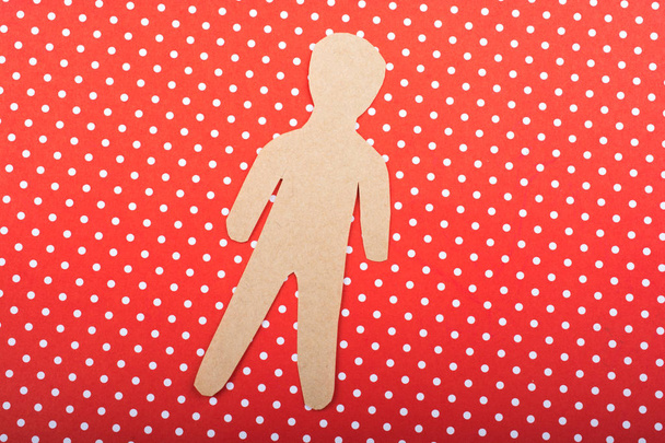 Little man figurine  cut out of brown paper - Photo, Image