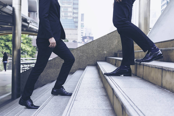 Business people walking on street in the city. Business travel concept - Foto, Imagem