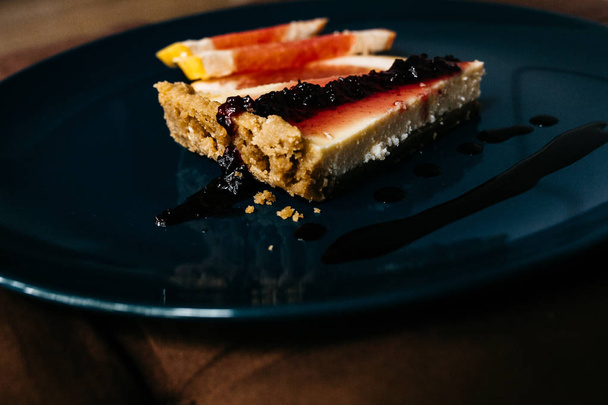 delicious Cheesecake with grapefruit slices on plate - Fotografie, Obrázek