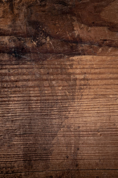 Wood texture, Dark Brown scratched wooden cutting board. Natural Dark Background. Flat lay, warm tone - Zdjęcie, obraz
