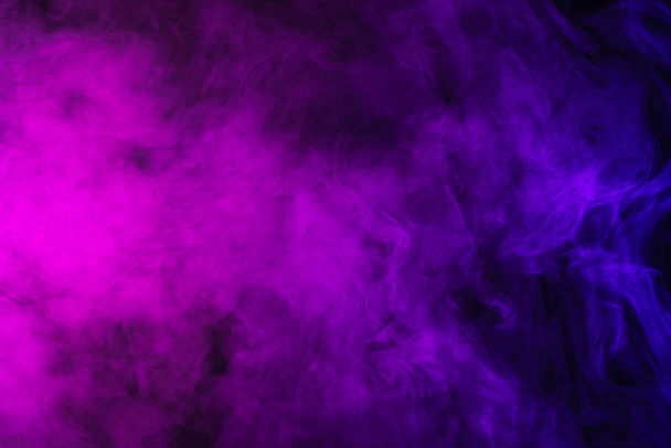 abstract pink and purple smoke on black background - Photo, Image