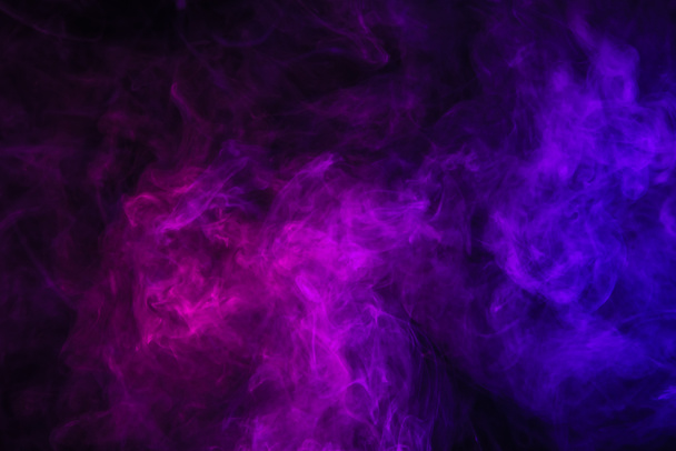 violet smoke on black background with copy space - Photo, Image