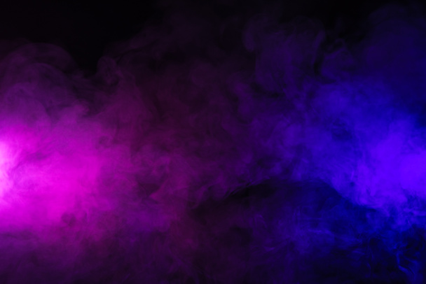 fumée rose et violette sur fond noir abstrait
 - Photo, image