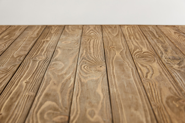 empty wooden tabletop isolated on grey - Photo, Image