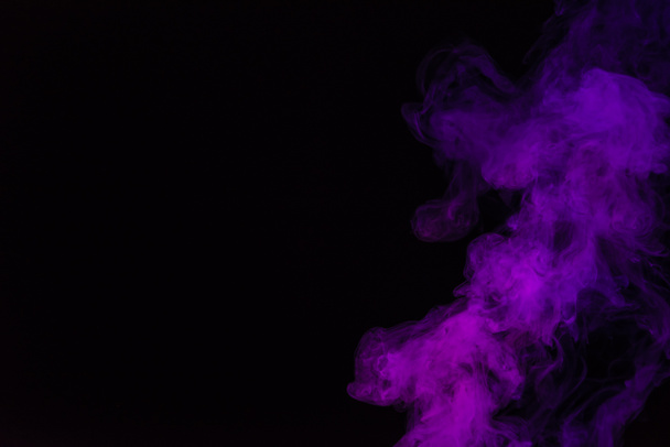 black background with purple smoke with copy space - Photo, Image
