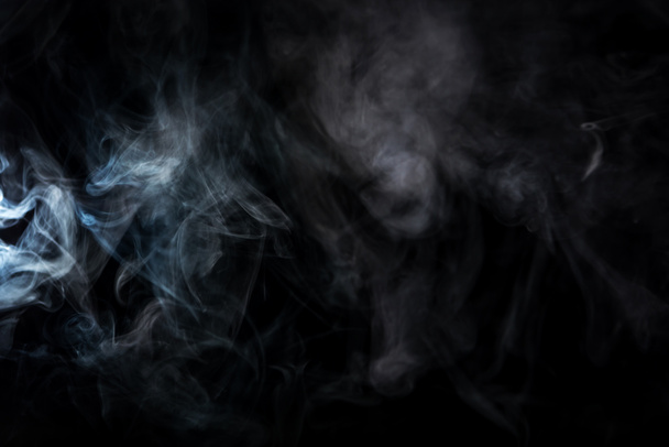 abstract background with grey smoky swirl on black - Foto, Imagem