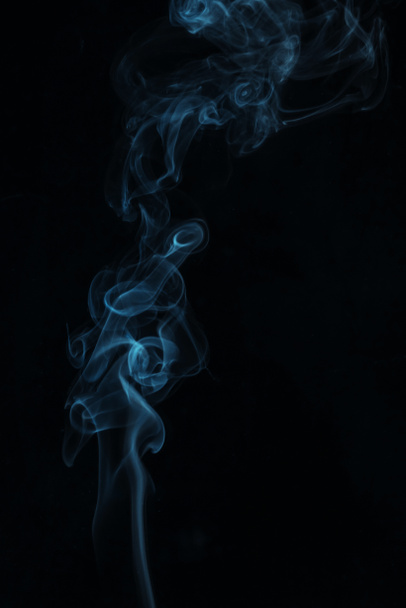 blue smoky swirl on black background - 写真・画像
