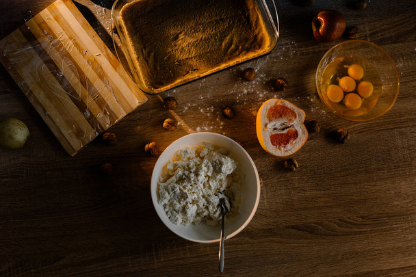 Ingredients for cheese cake on wooden table - Photo, Image