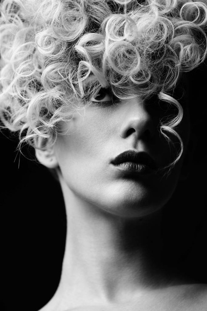 portrait of gorgeous woman with perfect makeup and curly hair, close-up - 写真・画像