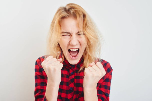 evil woman in checkered shirt yelling with opened mouth isolated on white background  - Photo, Image