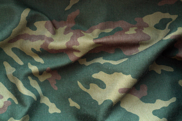 Military uniform pattern with blur effect. Abstract background and texture. - Photo, Image