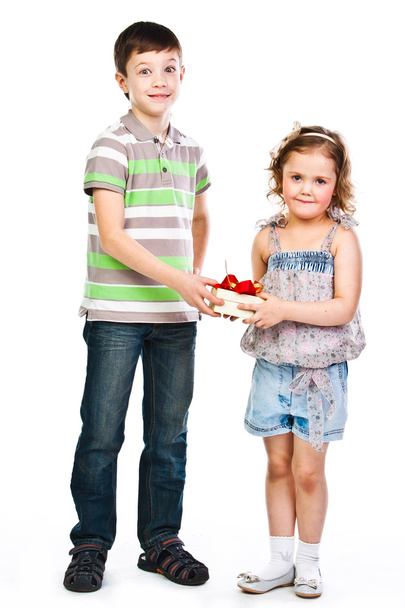 boy gives a girl a gift - Фото, изображение