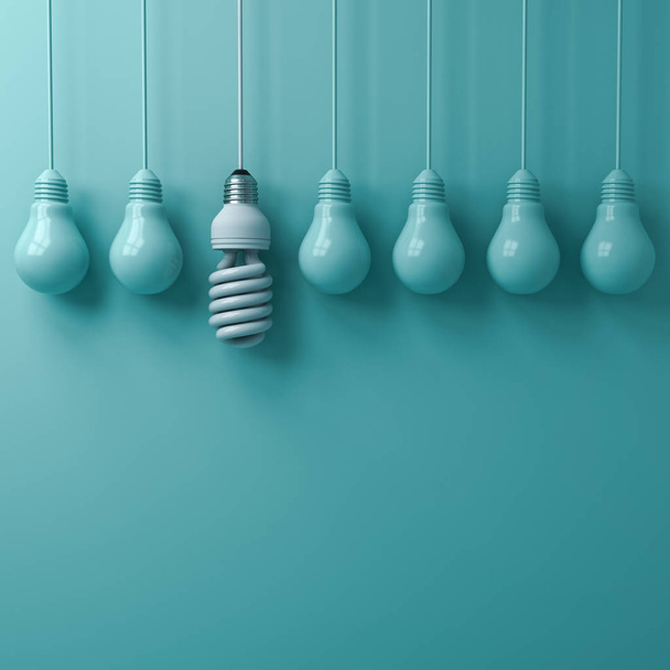 Una lampadina a risparmio energetico eco appesa che si distingue dalle lampadine a incandescenza spente su sfondo verde pastello, leadership e diversi concetti di idea creativa. Rendering 3D
. - Foto, immagini