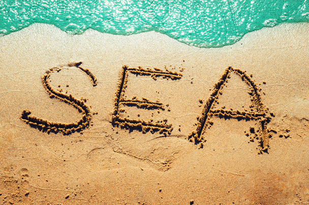 L'inscription sur le sable marin
 - Photo, image