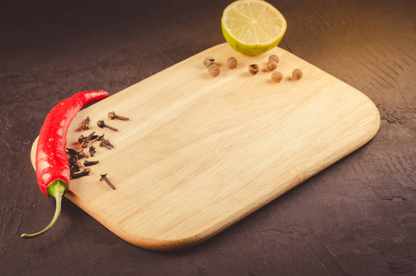 spices, fresh ingredients and empty cutting board/spices, fresh ingredients and empty cutting board. - Fotoğraf, Görsel