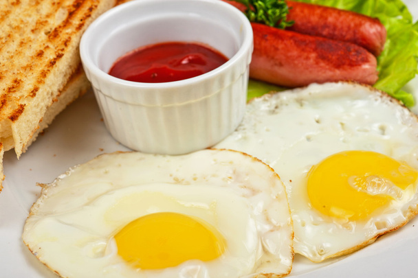 Fried eggs with sausages - Photo, Image