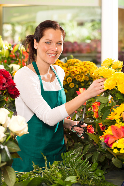 Cheerful woman flower shop market choosing working - Photo, Image