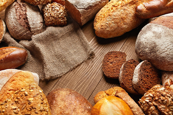 Bread Variety Still Life. Close Up Of Bakery Food On Wooden Table. High Resolution - Φωτογραφία, εικόνα