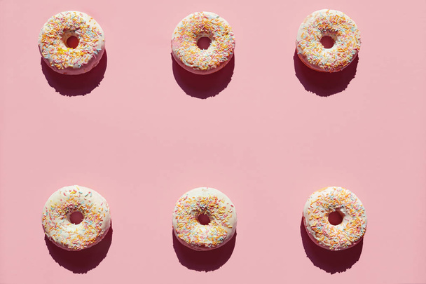 Donuts On Pink Background. Close Up Of Sweet Pastry Dessert With Sprinkles And Glaze. High Resolution - Fotó, kép