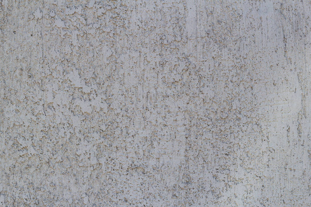 Achtergrond van de grijze betonnen muur ondiepe textuur. Externe decoratie van de muren van het gebouw - Foto, afbeelding