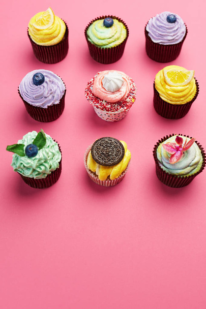 Colorful Cupcakes On Pink Background. Cake Desserts With Cream And Different Toppings. High Resolution - Foto, Bild
