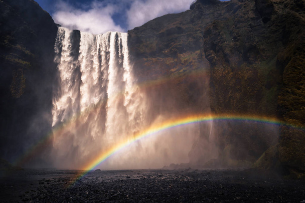 Skogafoss - May 04, 2018: Rainbows at the Skogafoss waterfall, Iceland - Fotó, kép